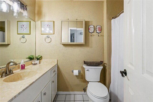 11805 Night Hawk, Corpus Christi, TX 78410 - full bathroom with tile patterned flooring, toilet, and vanity
