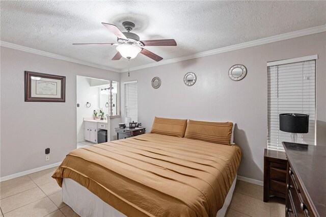 11805 Night Hawk, Corpus Christi, TX 78410 - bedroom with light tile patterned flooring, crown molding, baseboards, a textured ceiling, and ensuite bath