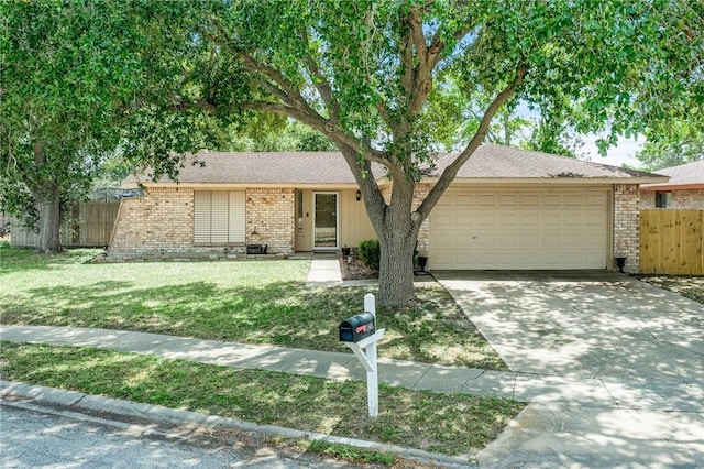 11805 Night Hawk, Corpus Christi, TX 78410 - ranch-style home with an attached garage, brick siding, concrete driveway, and a shingled roof