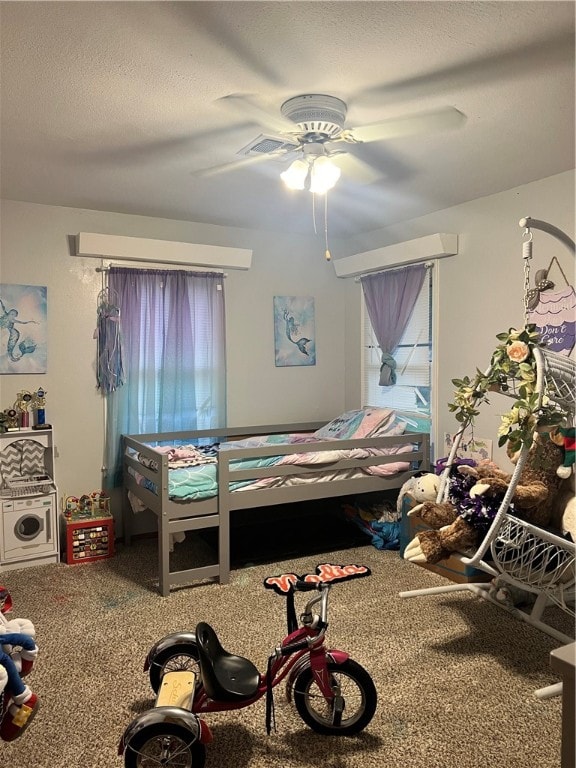 bedroom with ceiling fan, a textured ceiling, and carpet