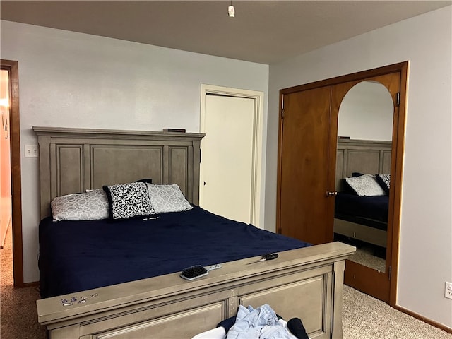 bedroom featuring carpet