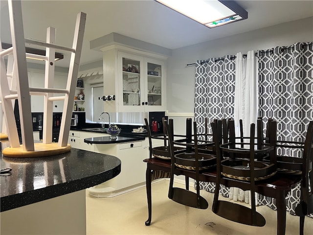 dining room featuring sink