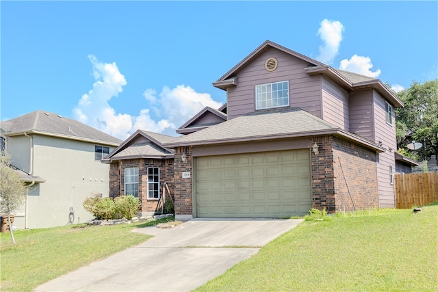 view of property with a garage and a front yard