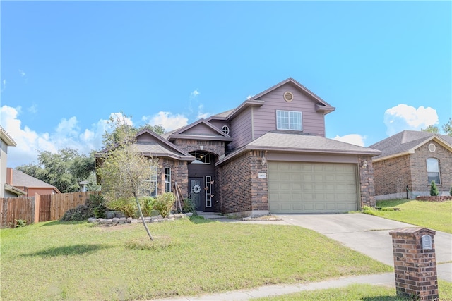 view of front property featuring a garage and a front yard