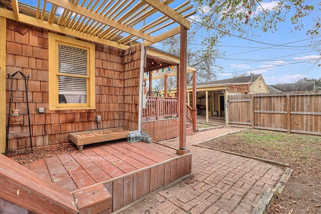 view of patio with a pergola and a deck