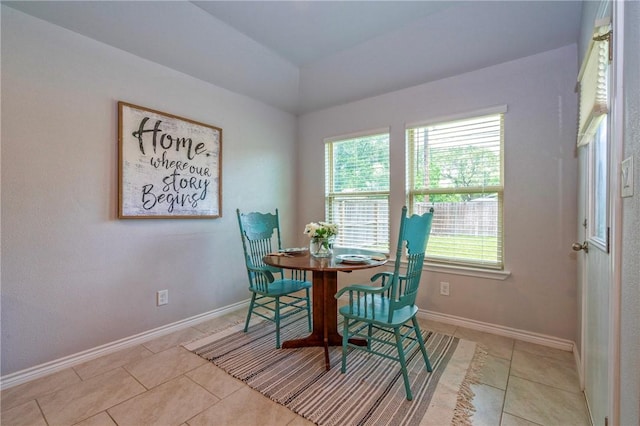 3922 Jayden Dr, Corpus Christi, TX 78410 - dining area featuring healthy amount of natural light, light tile patterned flooring, and lofted ceiling