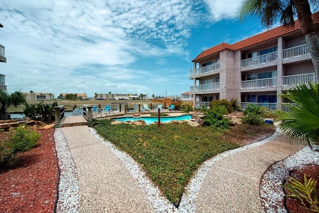 view of community featuring a swimming pool