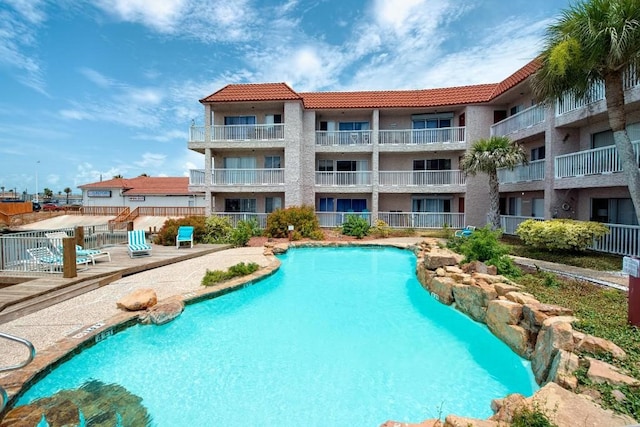 view of swimming pool featuring a patio