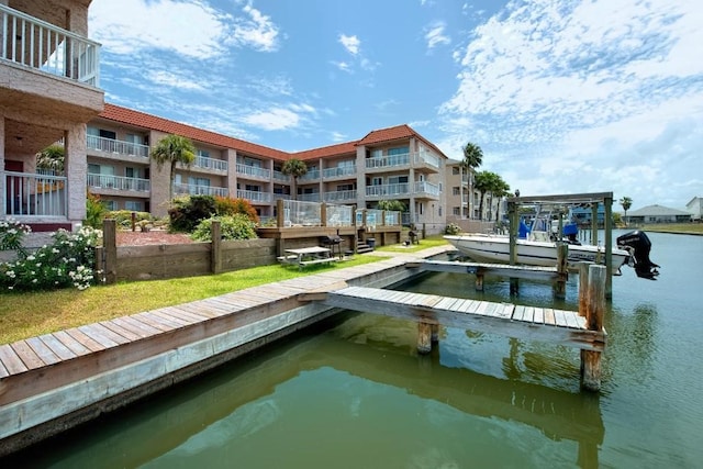 view of dock with a water view