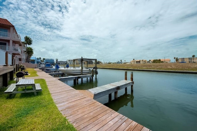 dock area featuring a water view