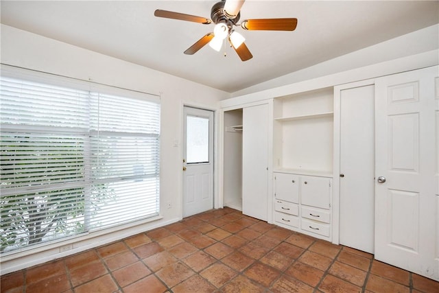 unfurnished bedroom with ceiling fan
