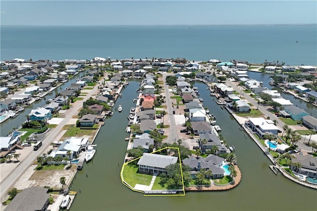 bird's eye view with a water view