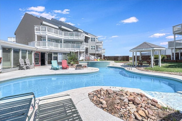 view of pool with a gazebo and a patio