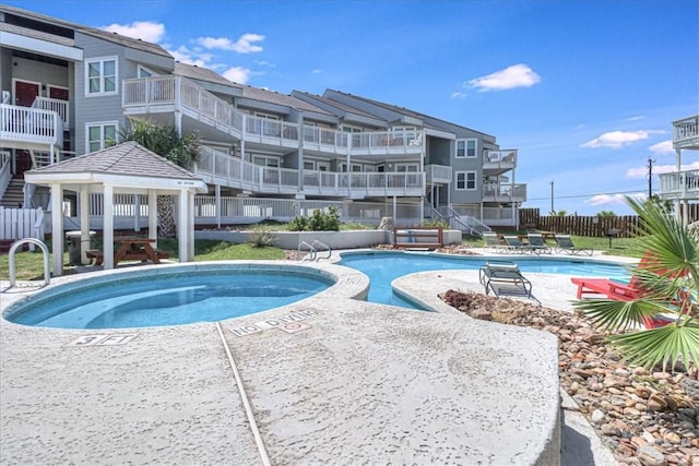 view of swimming pool with a gazebo