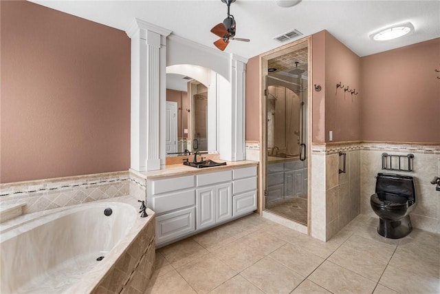 full bathroom with tile patterned flooring, vanity, separate shower and tub, and ceiling fan