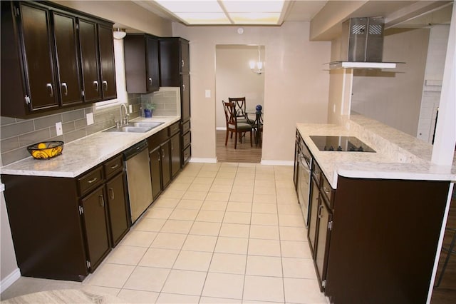 kitchen with stainless steel dishwasher, black electric cooktop, wall chimney range hood, sink, and pendant lighting