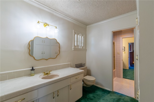 bathroom featuring vanity, a textured ceiling, and crown molding