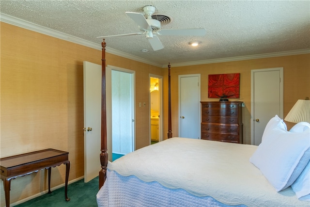 carpeted bedroom featuring ceiling fan, ensuite bath, a textured ceiling, and ornamental molding