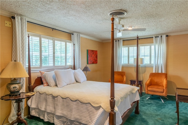 carpeted bedroom with ceiling fan, a textured ceiling, and ornamental molding