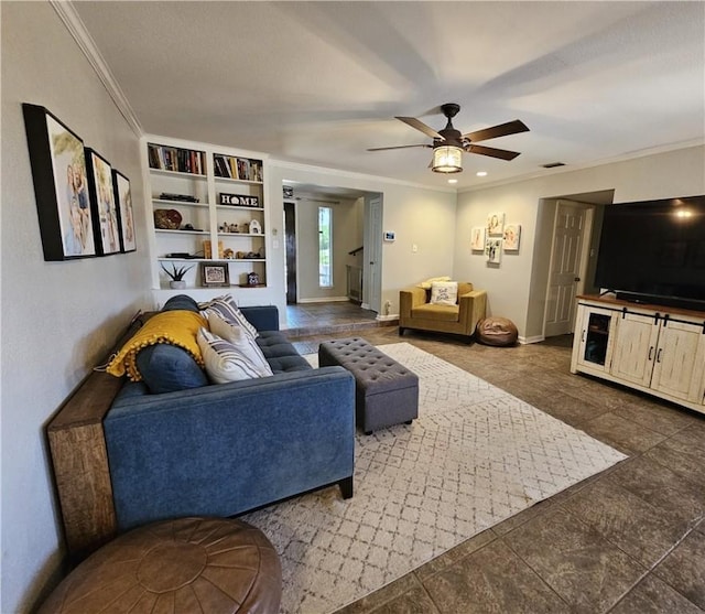 living room with baseboards, visible vents, a ceiling fan, and crown molding