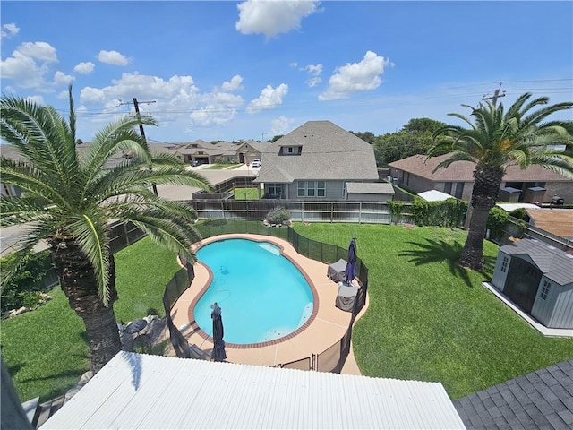 view of pool featuring a fenced backyard, a fenced in pool, and a yard