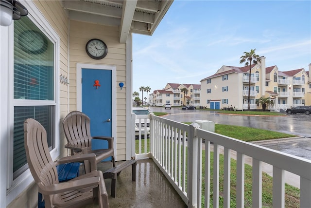 balcony featuring a porch