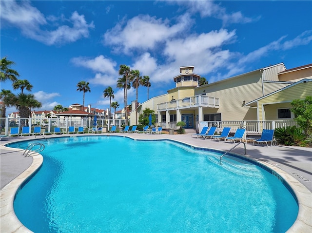 view of swimming pool featuring a patio