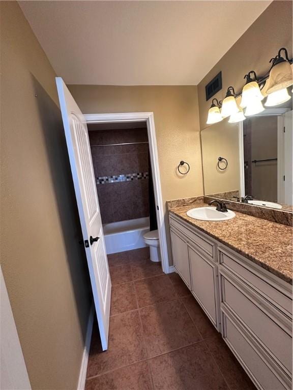 full bathroom with vanity, visible vents, baseboards, tile patterned flooring, and toilet