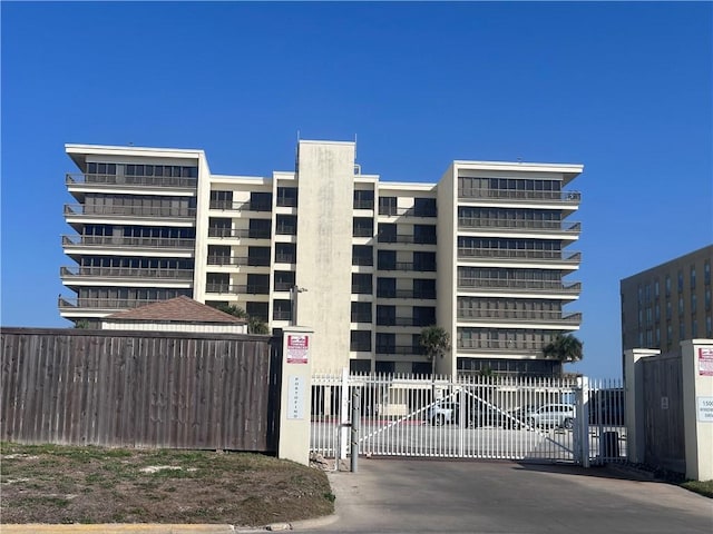 view of property with fence