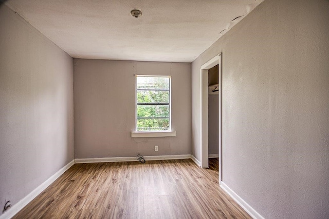 unfurnished bedroom with light hardwood / wood-style flooring