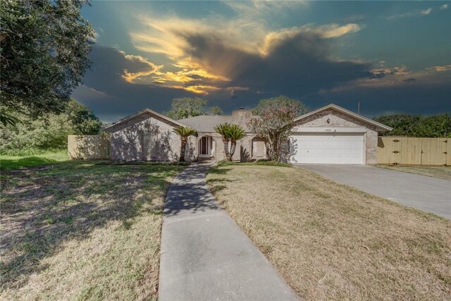 4621 Weiskopf, Corpus Christi, TX 78413 - ranch-style home featuring a garage, brick siding, and concrete driveway