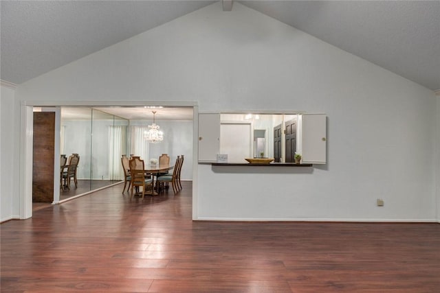 4621 Weiskopf, Corpus Christi, TX 78413 - living room with wood finished floors, high vaulted ceiling, and a chandelier