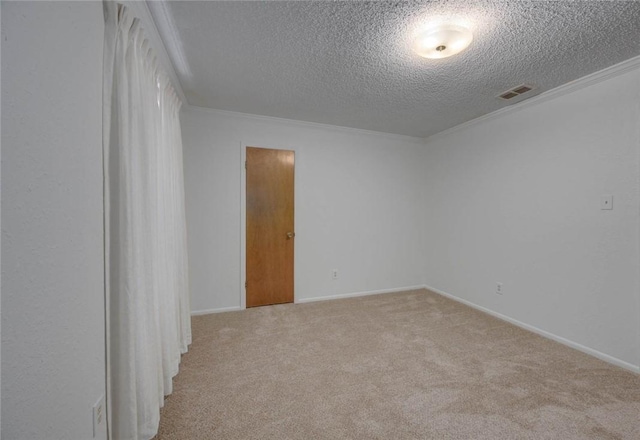 4621 Weiskopf, Corpus Christi, TX 78413 - carpeted empty room featuring a textured ceiling and crown molding