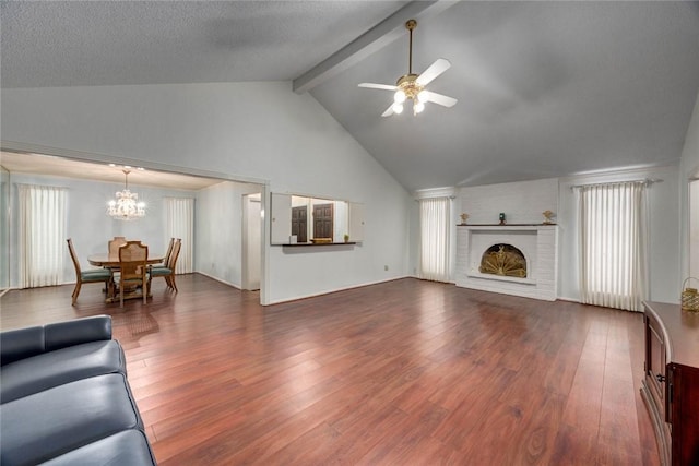 4621 Weiskopf, Corpus Christi, TX 78413 - living room featuring ceiling fan, high vaulted ceiling, beam ceiling, healthy amount of natural light, and a chandelier