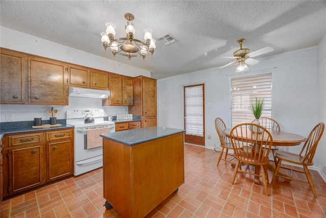 4621 Weiskopf, Corpus Christi, TX 78413 - kitchen featuring white range with electric stovetop, under cabinet range hood, brick patterned floors, dark countertops, and a textured ceiling