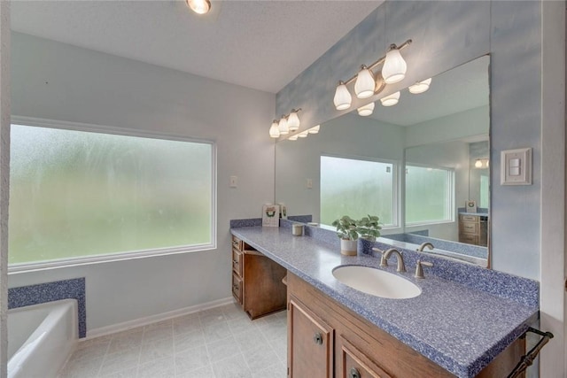 4621 Weiskopf, Corpus Christi, TX 78413 - bathroom with vanity and a garden tub