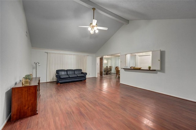 4621 Weiskopf, Corpus Christi, TX 78413 - living area featuring ceiling fan, beamed ceiling, wood finished floors, and high vaulted ceiling