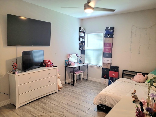 6721 Sharks Ct, Corpus Christi, TX 78414 - bedroom featuring light wood finished floors, baseboards, and a ceiling fan