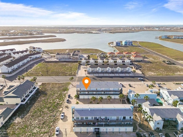 birds eye view of property featuring a residential view and a water view