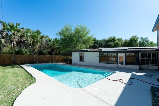 view of pool featuring a fenced in pool, fence private yard, and a patio area