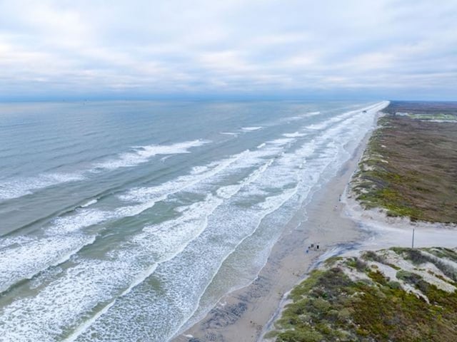 view of water feature with a beach view