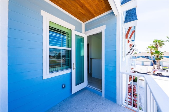 doorway to property with a porch