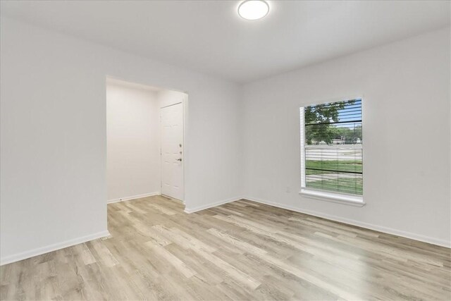 2108 Matagorda Dr, Portland, TX 78374 - spare room featuring light wood-style flooring and baseboards