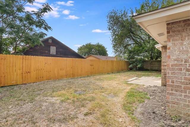 2108 Matagorda Dr, Portland, TX 78374 - fenced backyard featuring a patio