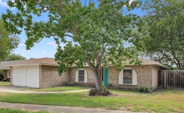 2108 Matagorda Dr, Portland, TX 78374 - single story home with a garage, brick siding, and concrete driveway