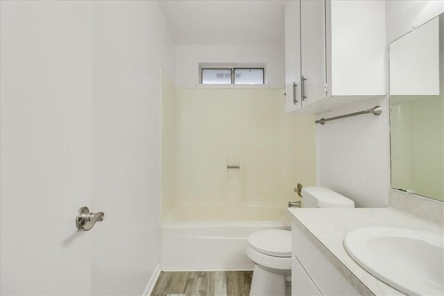 2108 Matagorda Dr, Portland, TX 78374 - bathroom with vanity, wood finished floors, and bathing tub / shower combination