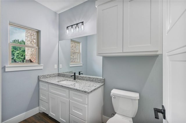 407 Main, Odem, TX 78370 - bathroom with vanity and wood finished floors
