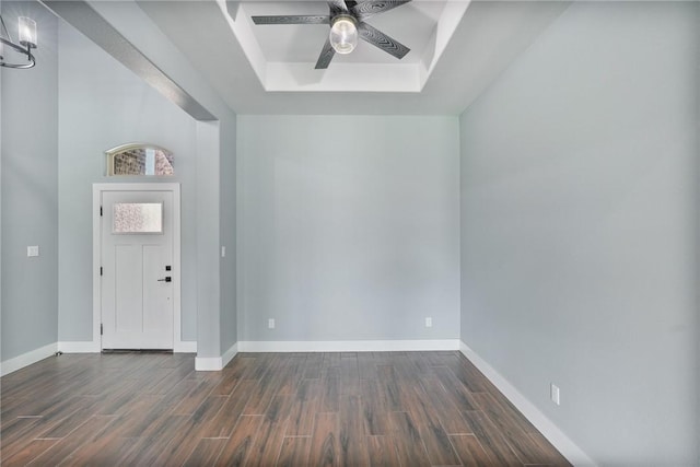407 Main, Odem, TX 78370 - foyer entrance with a raised ceiling, dark wood-style floors, and a ceiling fan
