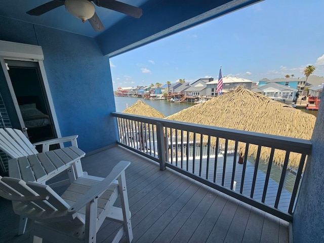 15333 Beaufort Ct, Corpus Christi, TX 78418 - balcony featuring a ceiling fan, a water view, and a residential view
