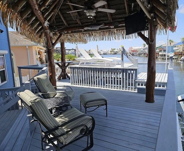 15333 Beaufort Ct, Corpus Christi, TX 78418 - deck featuring ceiling fan and a water view